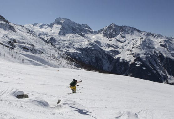 skier jumping over a jump French Alps