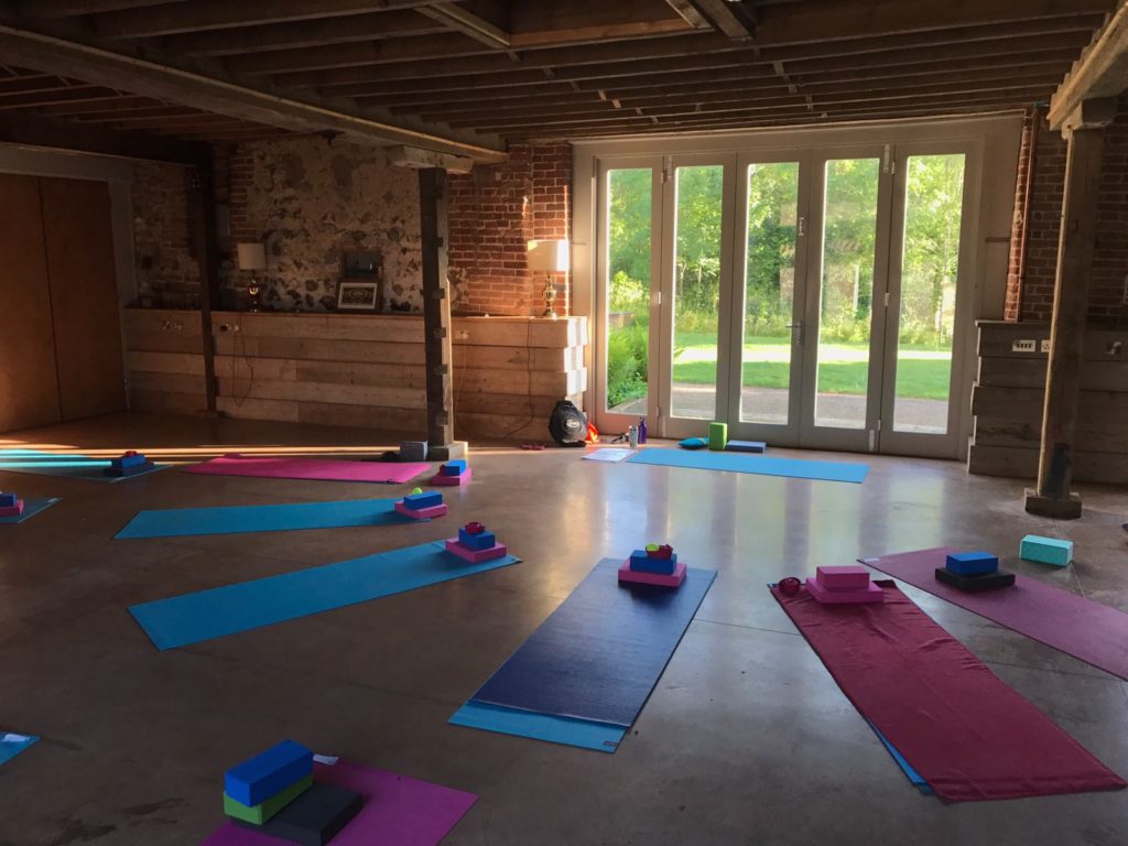 Yoga space with mats laid out yoga retreat norfolk