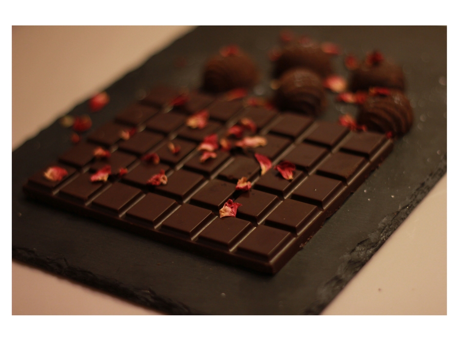 raw cacao chocolate recipe chocolate bar on table rose petals