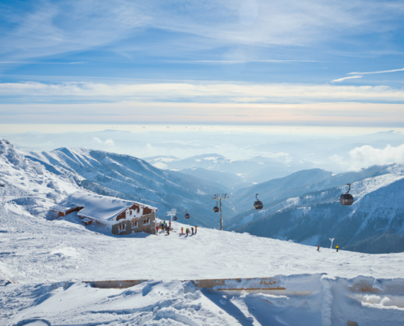 view of mountains in sunshine -mountain restauarant - jasna skiing and yoga holiday